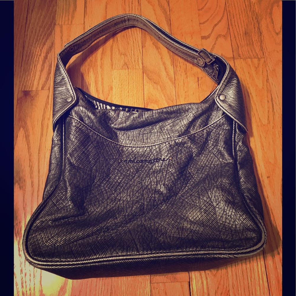 Rare, hard to find volcomstone metallic purse